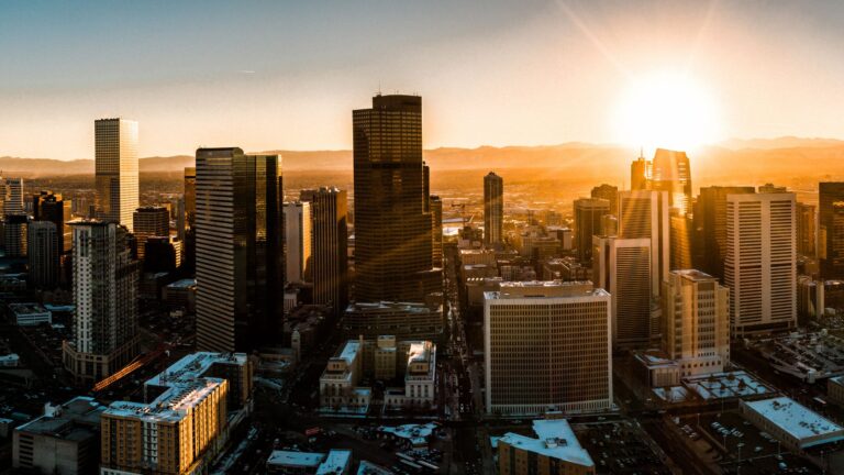 Denver Skyline with sun setting in the background