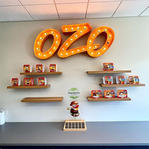 Retro-style interior channel letter sign for Ozo Foods in Lafayette, Colorado, created by Banner Signs Denver to enhance branding and create a unique visual appeal.