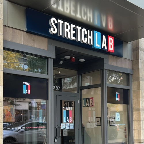 Channel letter business sign for StretchLab in Belmar, Denver, designed and installed by Banner Signs Denver to enhance visibility and brand presence.